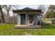 Charming guest house with covered porch, perfect for relaxing and enjoying the outdoors at 218 Miami Dr, Noblesville, IN 46062