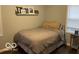 Bedroom with wood floor and a lot of sunlight at 2335 Durham Dr, Indianapolis, IN 46220