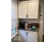 Bright corner in kitchen featuring white cabinets and dark hardware at 2335 Durham Dr, Indianapolis, IN 46220