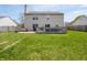 Expansive backyard with well-maintained lawn, patio, deck, perfect for outdoor living at 270 Lazy Hollow Dr, Brownsburg, IN 46112