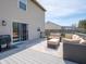 Spacious deck with comfortable outdoor furniture, grill, and sliding glass doors to the house at 270 Lazy Hollow Dr, Brownsburg, IN 46112