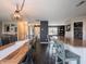 Dining area next to the kitchen with a view of the entryway, living room, and kitchen at 270 Lazy Hollow Dr, Brownsburg, IN 46112