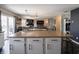 Open layout kitchen with views to the dining table and living room at 270 Lazy Hollow Dr, Brownsburg, IN 46112