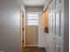 Bright laundry area featuring a window and washer and dryer with built in storage at 270 Lazy Hollow Dr, Brownsburg, IN 46112