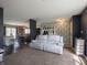 Spacious open-concept living room with hardwood flooring, comfortable seating, and natural light at 270 Lazy Hollow Dr, Brownsburg, IN 46112