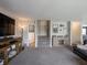 Spacious living area with a view of the staircase and a convenient powder room at 270 Lazy Hollow Dr, Brownsburg, IN 46112