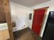 Functional laundry room with washer/dryer hookups, wood-look flooring, and a conveniently placed electrical panel at 2975 High Rock Dr, Martinsville, IN 46151