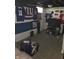 Finished basement with carpet and decorated with sports memorabilia and casual decor at 3101 N Temple Ave, Indianapolis, IN 46218