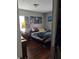 Cozy bedroom with wood floors, natural light, and personal decorative touches at 3101 N Temple Ave, Indianapolis, IN 46218