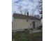Charming exterior view of a cozy home with a brown roof and vinyl siding at 3101 N Temple Ave, Indianapolis, IN 46218