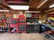 Functional garage space with ample storage, workbench, and tool organization system at 3155 W 57Th St, Indianapolis, IN 46228