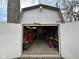 Exterior view of garage providing workshop space and secure storage solutions for tools and equipment at 3155 W 57Th St, Indianapolis, IN 46228