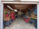 Spacious garage featuring workbench, tools, storage, and ample room for various projects and hobbies at 3155 W 57Th St, Indianapolis, IN 46228