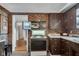Classic kitchen with stove, oven, and open microwave perfect for any home chef at 3155 W 57Th St, Indianapolis, IN 46228