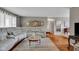 Bright living room with stylish couch, hardwood floors, and decor at 3155 W 57Th St, Indianapolis, IN 46228