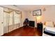 Cozy bedroom featuring a window with curtains and a comfortable bed at 3316 Gainesville Ct, Indianapolis, IN 46227