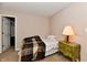 Bedroom with single bed, bedside table, and wood-look flooring at 3316 Gainesville Ct, Indianapolis, IN 46227