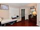 Bedroom featuring hardwood floors, a large closet, and antique-style furnishings at 3316 Gainesville Ct, Indianapolis, IN 46227