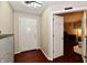 Inviting entryway with hardwood floors and a view into the prayer room with comfortable furniture and decor at 3316 Gainesville Ct, Indianapolis, IN 46227