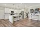 Modern kitchen with white cabinetry, stainless steel appliances, and a center island at 3572 Westmore Cir, Bargersville, IN 46106