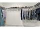 Spacious walk-in closet with shelving and hanging racks for organized storage at 3572 Westmore Cir, Bargersville, IN 46106