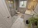 Bathroom with a glass shower, marble vanity, and a tiled floor at 366 E 200 N, Franklin, IN 46131