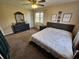 Bedroom offers a ceiling fan, carpet, and natural light, creating a calming and inviting atmosphere at 366 E 200 N, Franklin, IN 46131