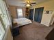 Bedroom featuring natural light, a ceiling fan, carpet, and a calming atmosphere for relaxation and rejuvenation at 366 E 200 N, Franklin, IN 46131