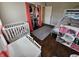 Spacious bedroom features a crib, bunk beds, a table and chairs, and closet space for functional living at 366 E 200 N, Franklin, IN 46131