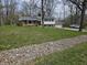 Charming two-story home with a brick facade, attached garage, and a spacious front yard at 366 E 200 N, Franklin, IN 46131