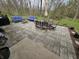 Stone patio with dining set and outdoor furniture, perfect for entertaining in your backyard at 366 E 200 N, Franklin, IN 46131
