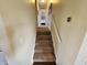 Carpeted staircase leading to the upper level of the home, with neutral paint and a handrail at 366 E 200 N, Franklin, IN 46131