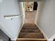 Carpeted stairs lead to a playroom in this home, perfect for Gathering fun and relaxation at 366 E 200 N, Franklin, IN 46131