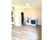 Laundry room including a washer, dryer, and built-in storage space on a light vinyl floor at 404 W Green St, Lebanon, IN 46052