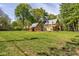 Vast backyard with a detached garage, offering ample space for recreation and gardening at 4151 N Pennsylvania St, Indianapolis, IN 46205