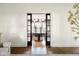 Dining Room view with hardwood flooring and large window at 4151 N Pennsylvania St, Indianapolis, IN 46205