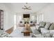 Bright and spacious living room with hardwood floors and modern lighting at 4151 N Pennsylvania St, Indianapolis, IN 46205