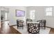 Inviting living room with stylish chairs, a plush rug, and elegant decor at 4151 N Pennsylvania St, Indianapolis, IN 46205