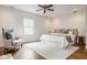 Relaxing bedroom with cozy furnishings, plush rug, and lots of natural light at 4151 N Pennsylvania St, Indianapolis, IN 46205
