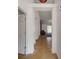 Hallway with neutral tile flooring leading into a well-lit living space at 4323 Stubbington Ln, Indianapolis, IN 46239
