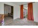 Bright living room featuring tile floors, large windows, and a view into an adjacent sitting room at 4323 Stubbington Ln, Indianapolis, IN 46239