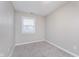 Neat bedroom featuring fresh paint and natural light at 4326 Burrwood Dr, Indianapolis, IN 46235