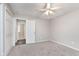 Bedroom with fresh paint, a ceiling fan, and two closets at 4326 Burrwood Dr, Indianapolis, IN 46235