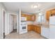 Kitchen with ample counter space, white appliances, and ample storage at 4326 Burrwood Dr, Indianapolis, IN 46235