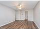 The living room features new flooring, neutral walls, and a ceiling fan at 4326 Burrwood Dr, Indianapolis, IN 46235