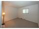 Bedroom featuring neutral carpet and walls, and window at 4329 Dudley N Dr, Indianapolis, IN 46237