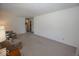 Expansive living room with neutral carpet, showing ample space and natural light at 4329 Dudley N Dr, Indianapolis, IN 46237