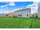 Large, well-maintained backyard with lush green grass, perfect for outdoor activities at 4546 Creighton Ln, Indianapolis, IN 46237