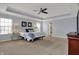 Spacious bedroom with trey ceiling, carpet, and abundant natural light, creating a peaceful and inviting sanctuary at 4546 Creighton Ln, Indianapolis, IN 46237