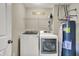 Well-equipped laundry room with modern washer and dryer, maximizing convenience and efficiency at 4546 Creighton Ln, Indianapolis, IN 46237